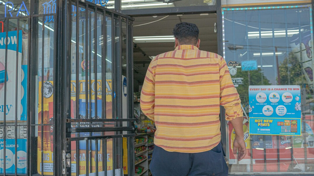 store security guard watching cameras