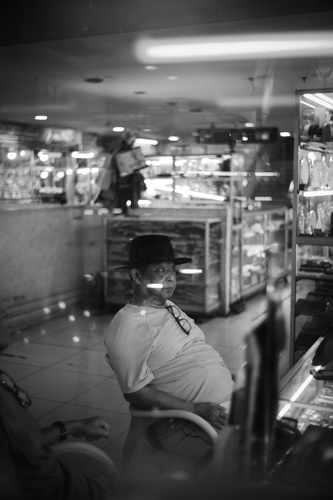 store security guard watching cameras
